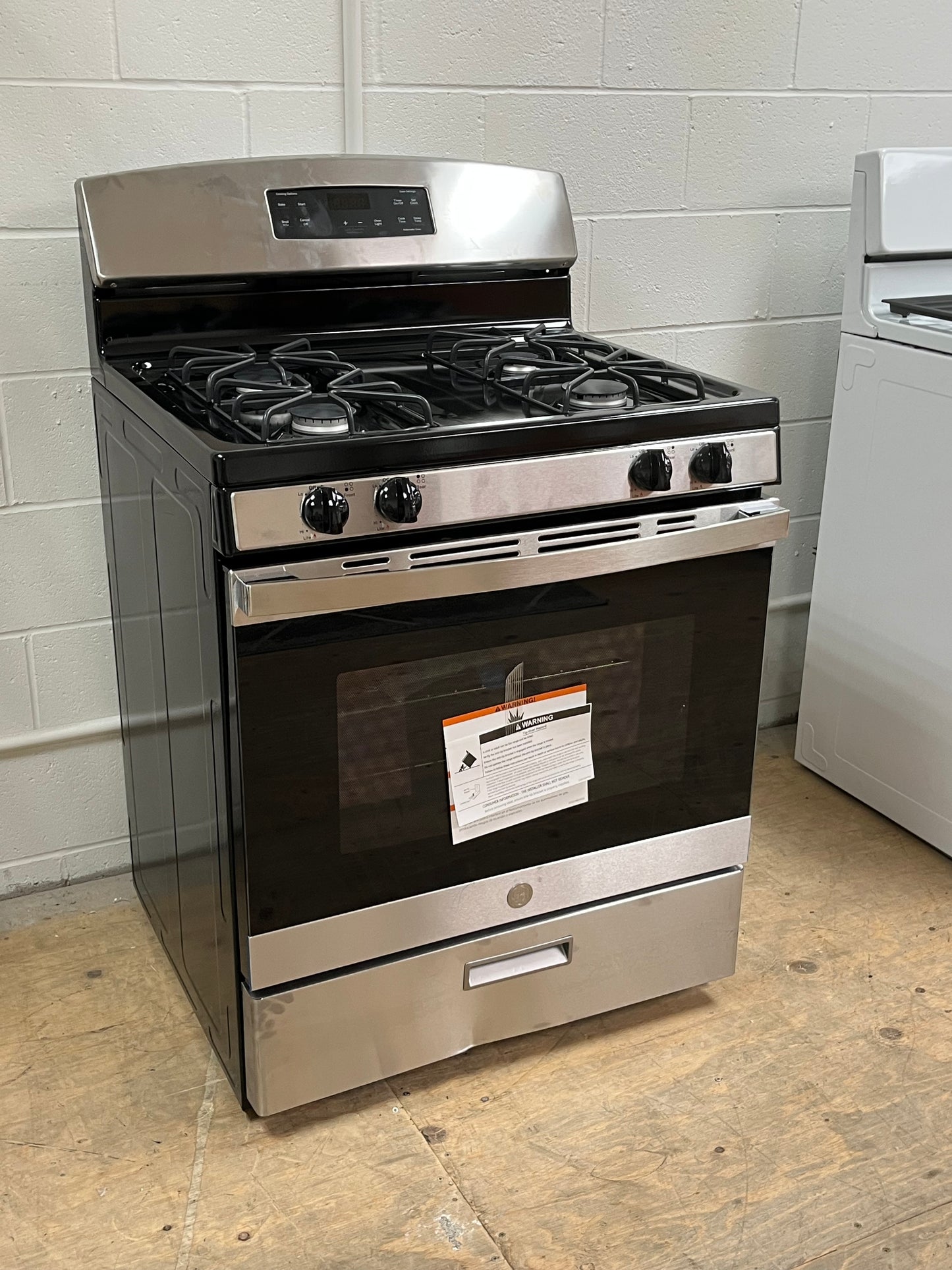 GE 4.8 cu. ft. Freestanding Gas Range Dented