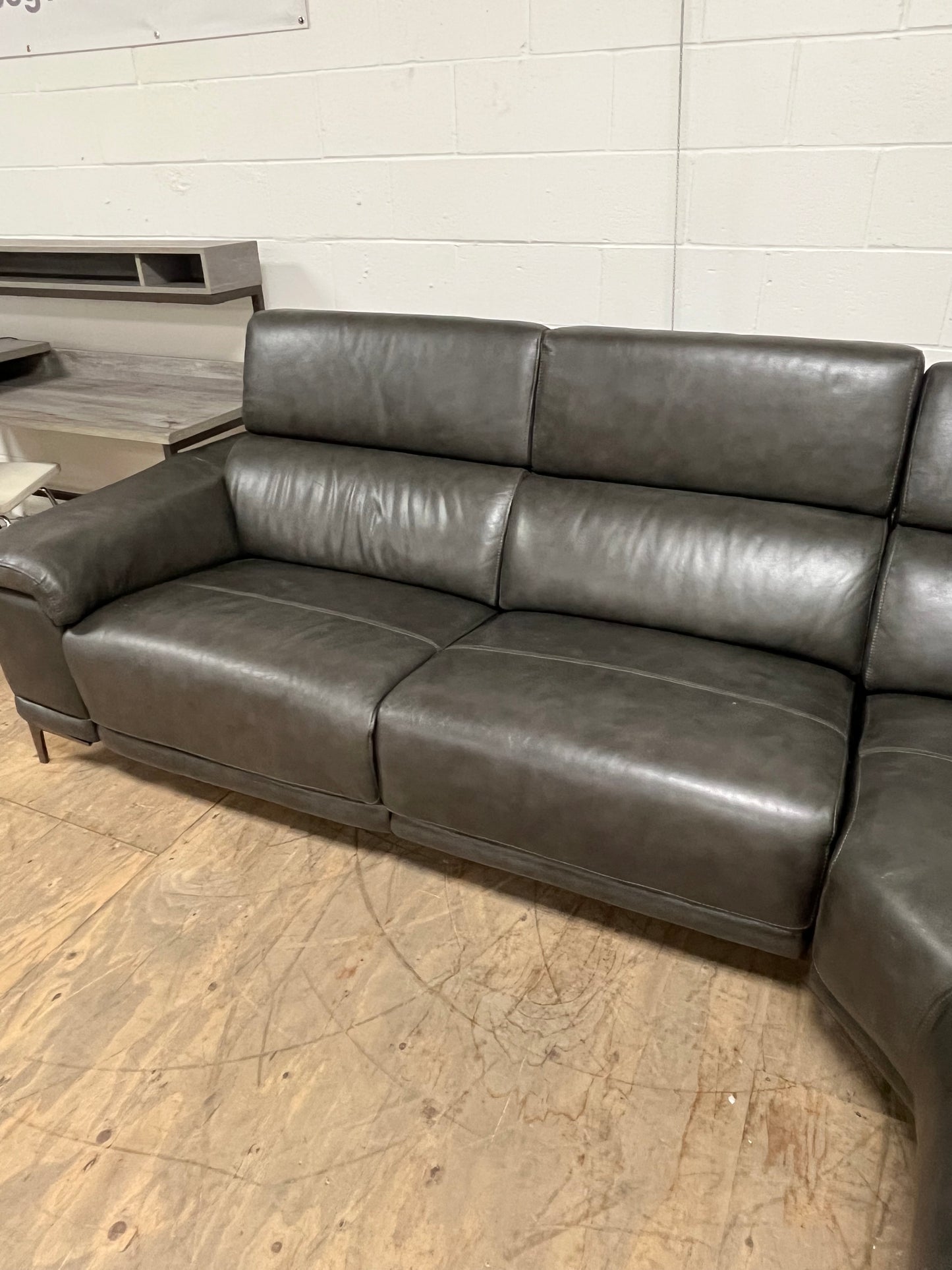 Living Spaces Leather Sectional Couch With Reclining Seat