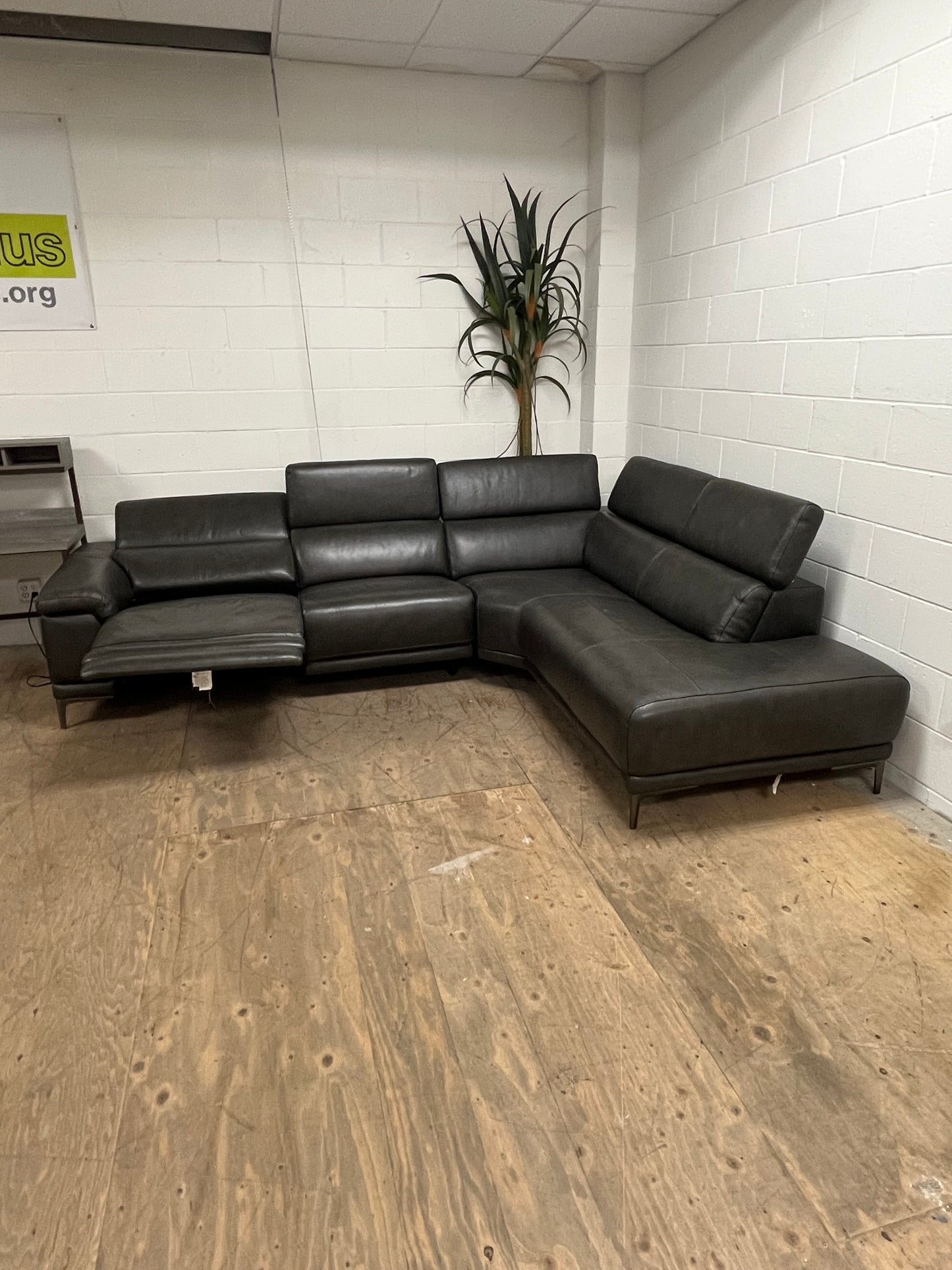 Living Spaces Leather Sectional Couch With Reclining Seat