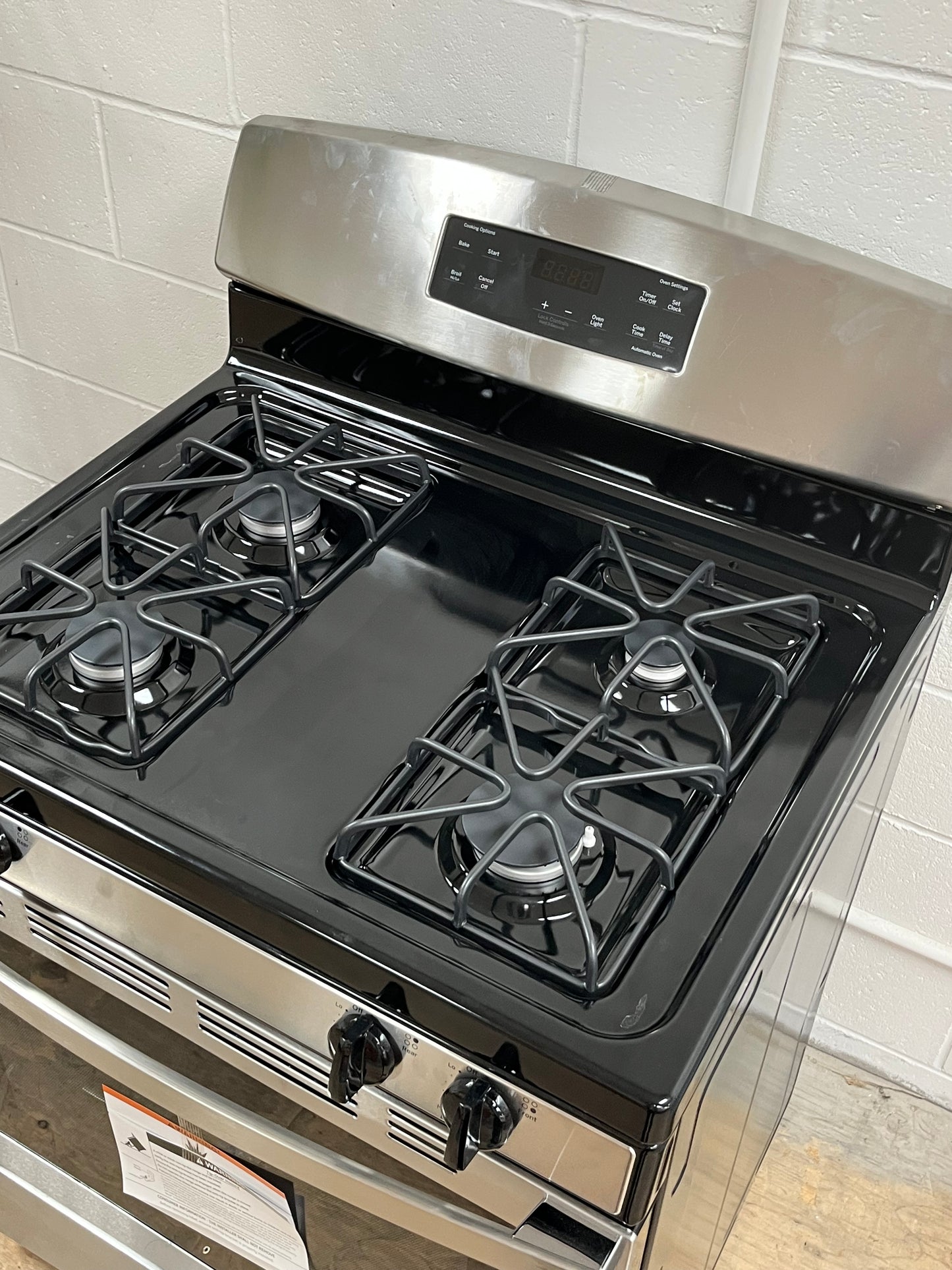 GE 4.8 cu. ft. Freestanding Gas Range Dented