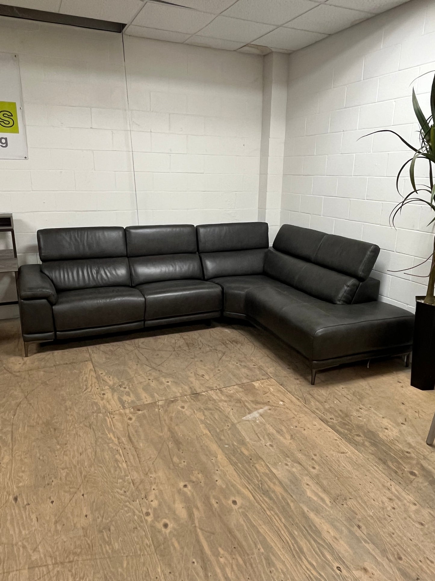 Living Spaces Leather Sectional Couch With Reclining Seat