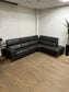 Living Spaces Leather Sectional Couch With Reclining Seat