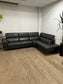 Living Spaces Leather Sectional Couch With Reclining Seat